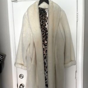 White faux fur coat